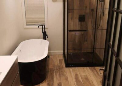 Modern Bathroom With Wood-Look Tile Floors